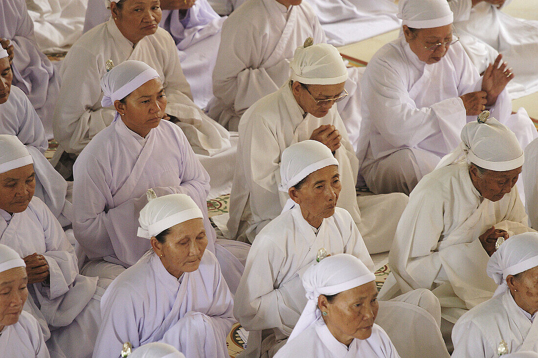 Ceremony in Cao Dai temple,  Tay Ninh,  Vietnam
