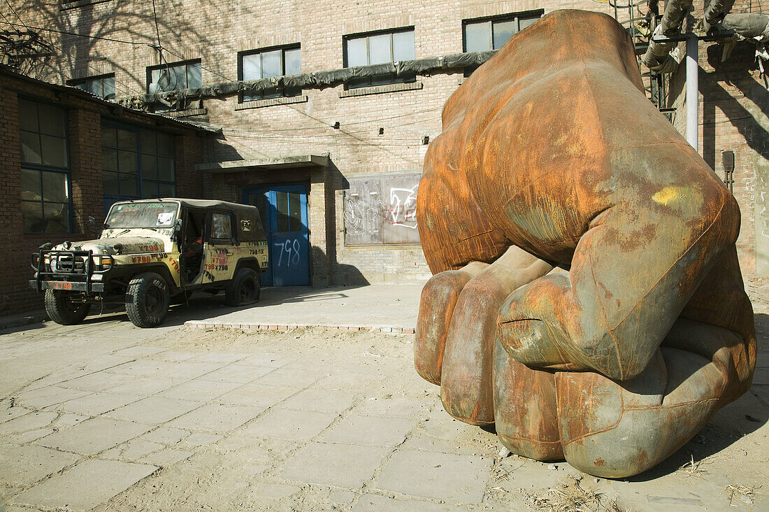 China. Beijing. Chaoyang District. Dashanzi 798 Art District. Factory Area converted to Arts District. Big bronze fist