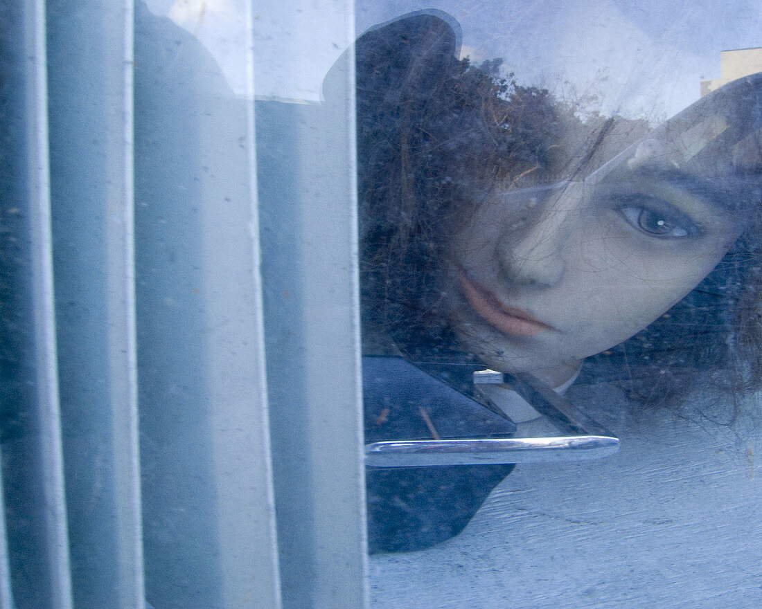 head of mannequin with sad expression.