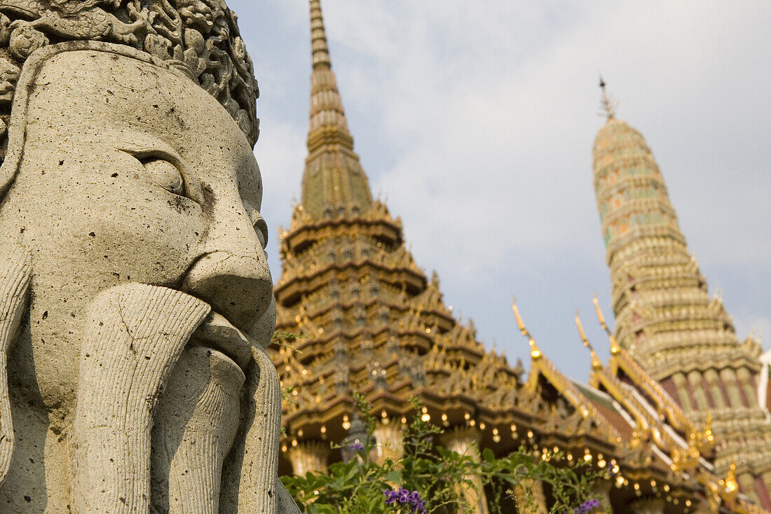 Statue and towers of the Royal Grand Palace, Bangkok, Thailand, Asia