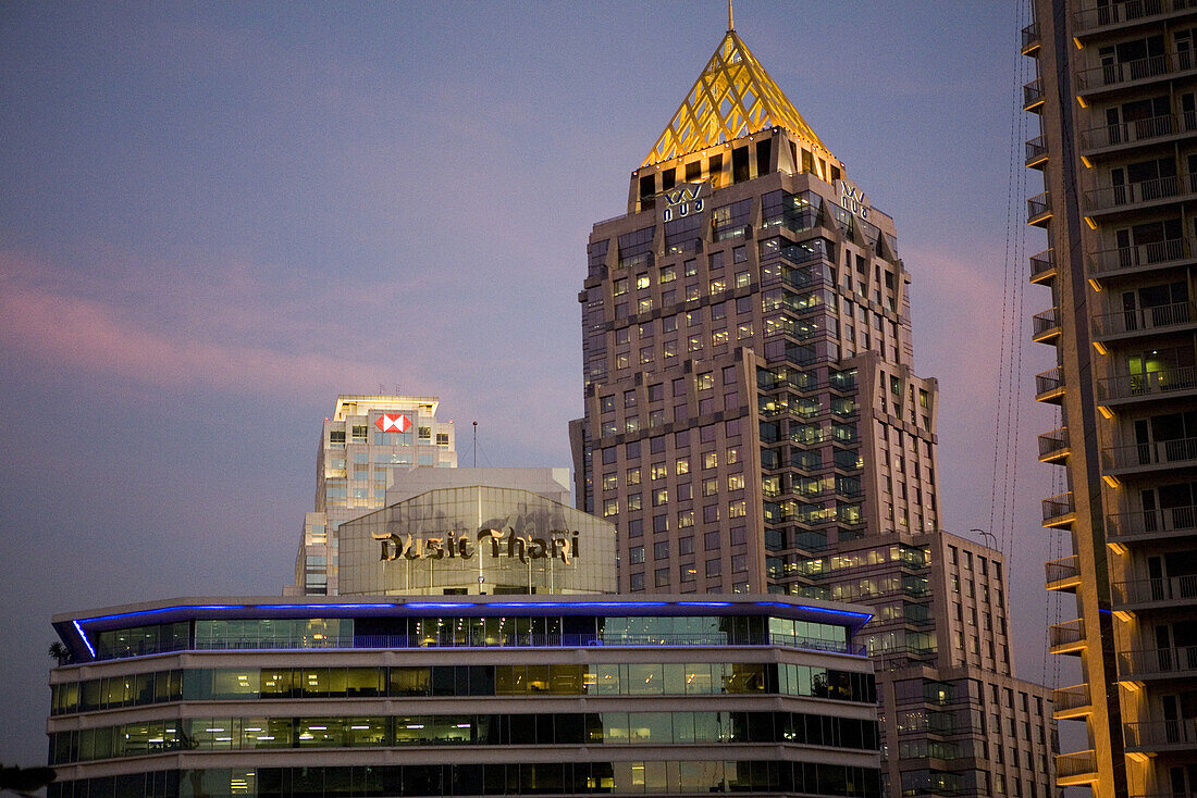 Modern building and high rise building at dusk, Bangkok, Thailand, Asia