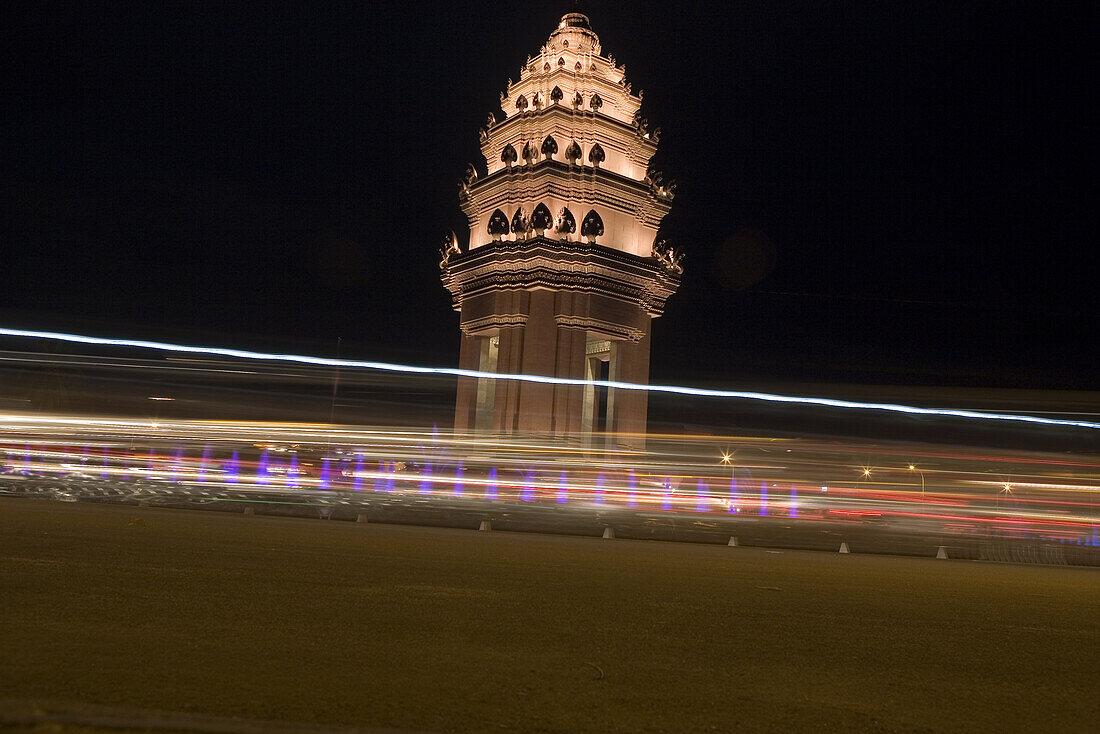 The illuminated Independence Monument at night in Phnom Penh, Cambodia, Asia