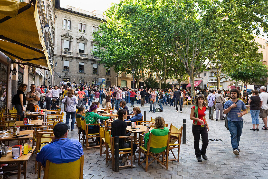 People at street cafes in the old town of Palma, Mallorca, Spain, Europe