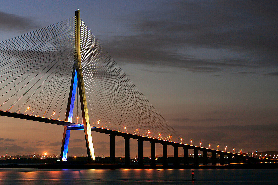 A View At Night Of The Normandy Bridge Which Spans The Seine Between Honfleur And Le Havre, A 2143 Meter Cable-Stayed Bridge With 856 Meters Between The Towers, Calvados (14), Normandy, France