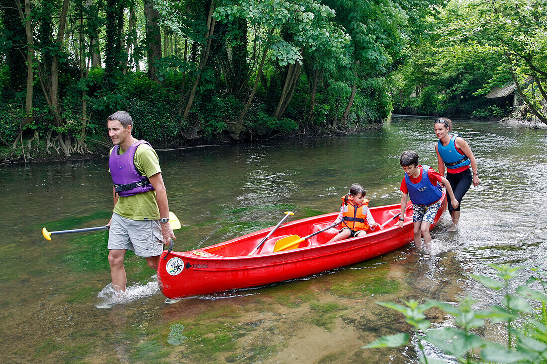 Pulling The Boat, Canoeing-Kayaking Down The Huisne Between Margon And Nogent-Le-Rotrou, Region Of Perche, Eure-Et-Loir (28), France