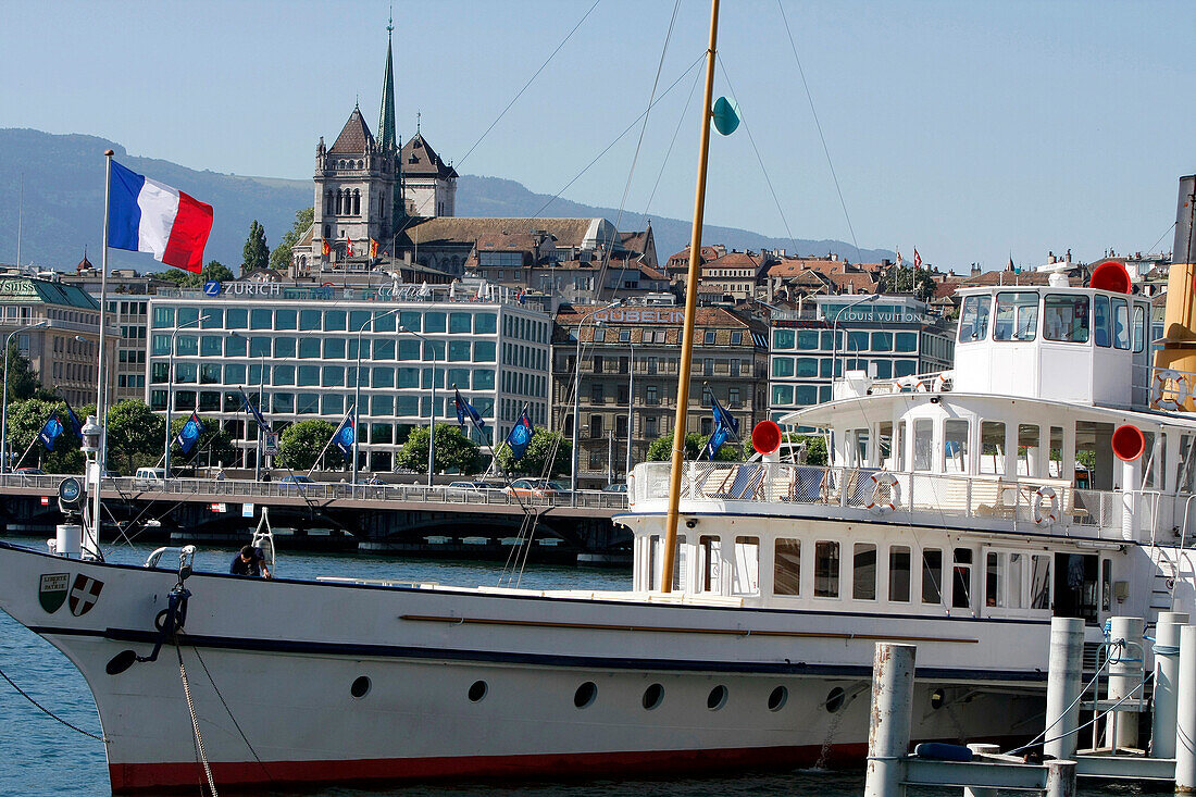 Cruise Boat On Lake Geneva In Front Of The City Of Geneva And Saint Peter'S Cathedral, Geneva, Switzerland