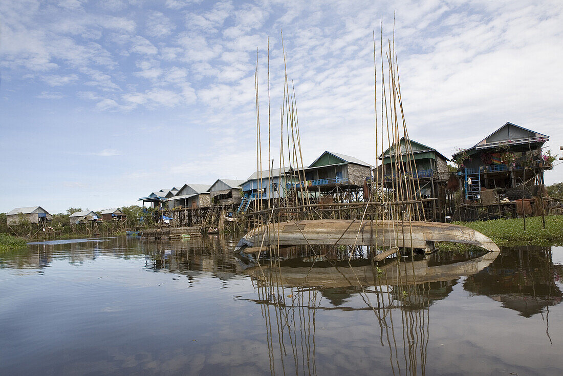 Fishing village Kampong Phlug at Tonle Sap Lake under clouded sky, Siem Reap Province, Cambodia, Asia