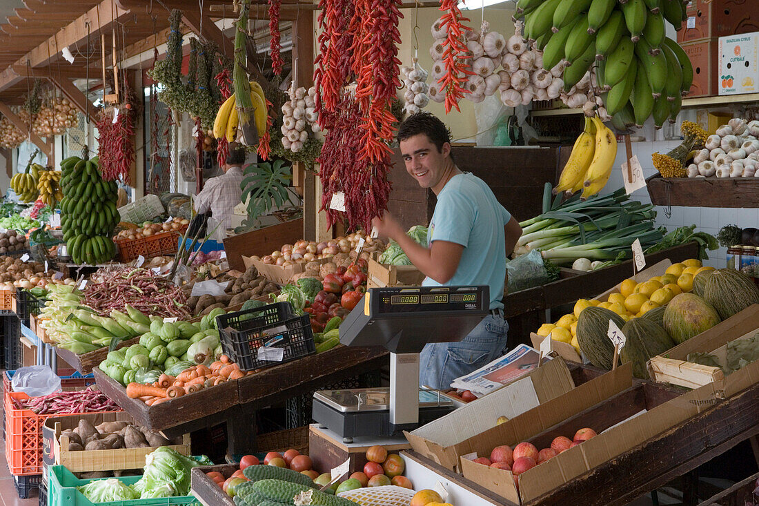 Fruit and vegetable stall at Mercado dos Lavradores Market Hall, Funchal, Madeira, Portugal