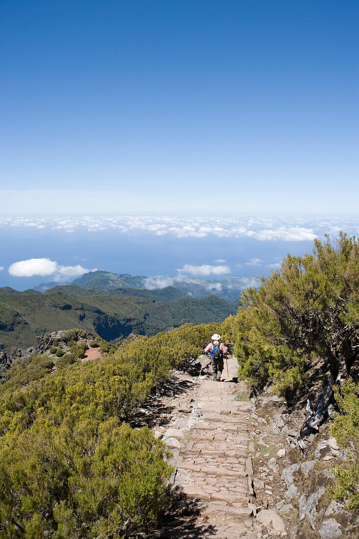 Hikers descend from Summit of Pico Ruivo Mountain, Pico Ruivo, Madeira, Portugal