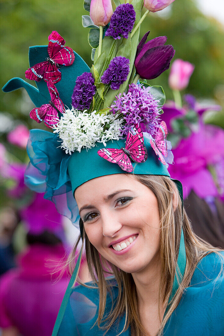 Young woman with flower headdress at the Madeira Flower Festival, Funchal, Madeira, Portugal