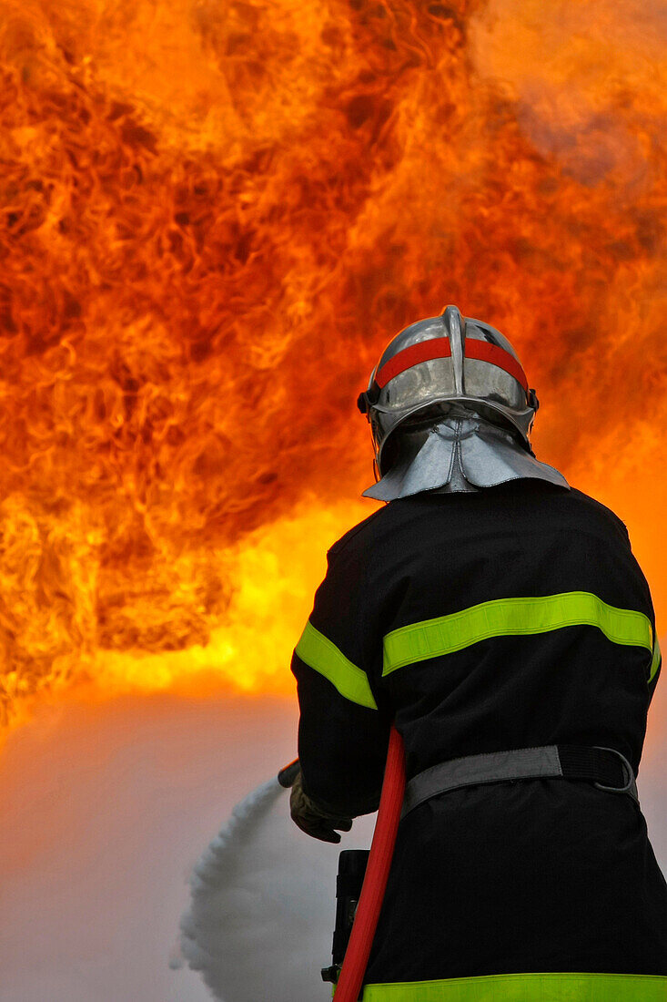 Extinction Of A Fire With A Foam Hose. Training Of The Firefighters Of The Sdis38 In Hydrocarbon Fires, Gesip (Studies Group For Safety In The Petrol And Chemical Industries) Of Roussillon, Isere (38), France