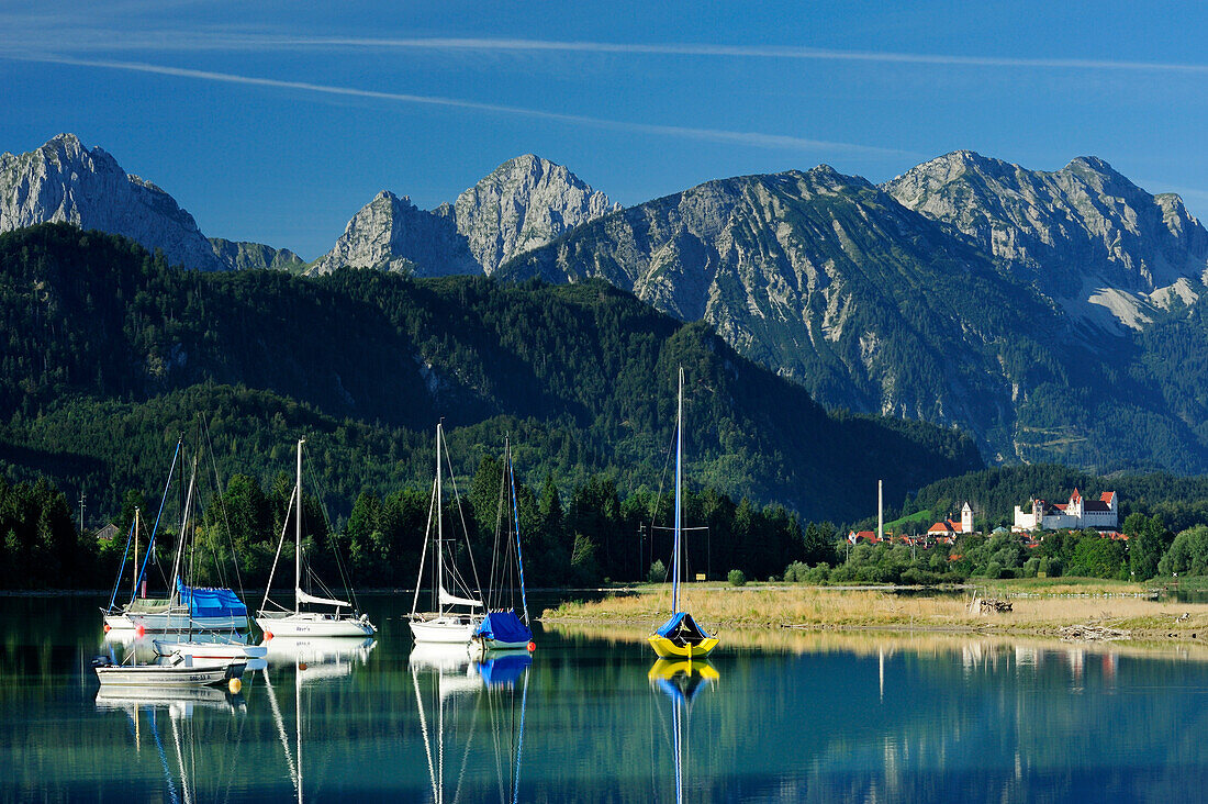 Lake Forggensee with sailboats, Fuessen, Allgaeu, Bavaria, Germany