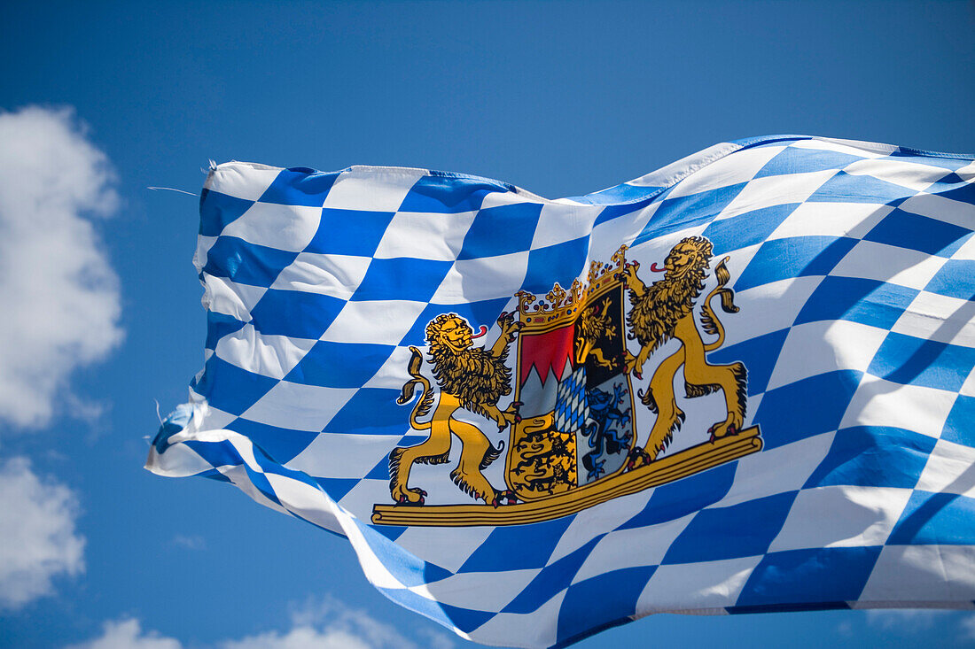 Bavarian Flag blowing in the wind during a Bavarian Theme Party on board Cruiseship MS Delphin Voyager, Bayrischer Fruehschoppen, Atlantic Ocean, near Azores, Portugal, Europe