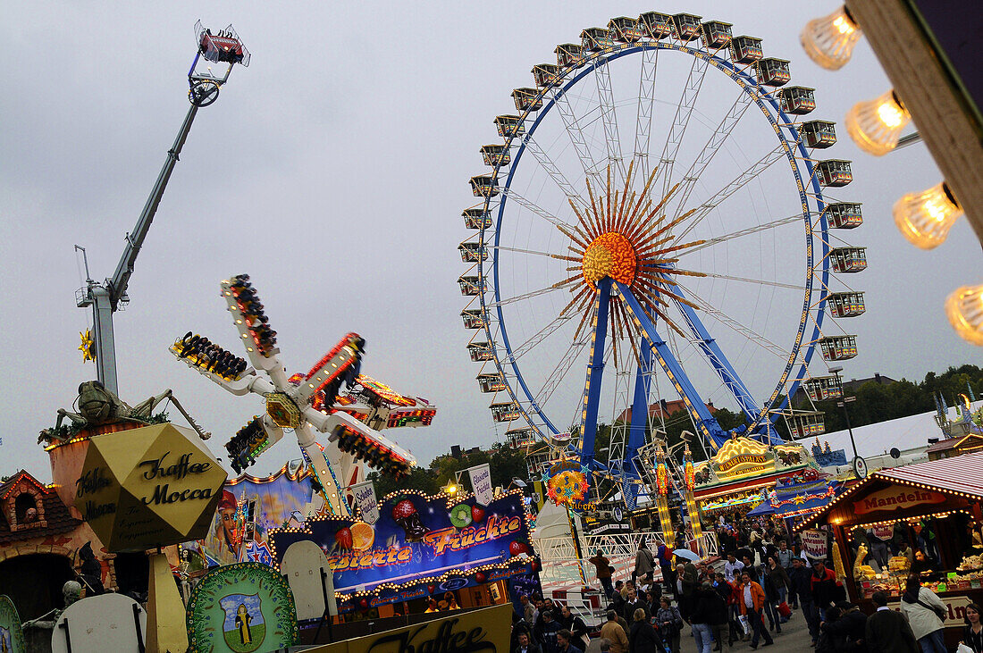 Ferris wheel and fun rides at the Oktoberfest, Munich, Bavaria, Germany, Europe