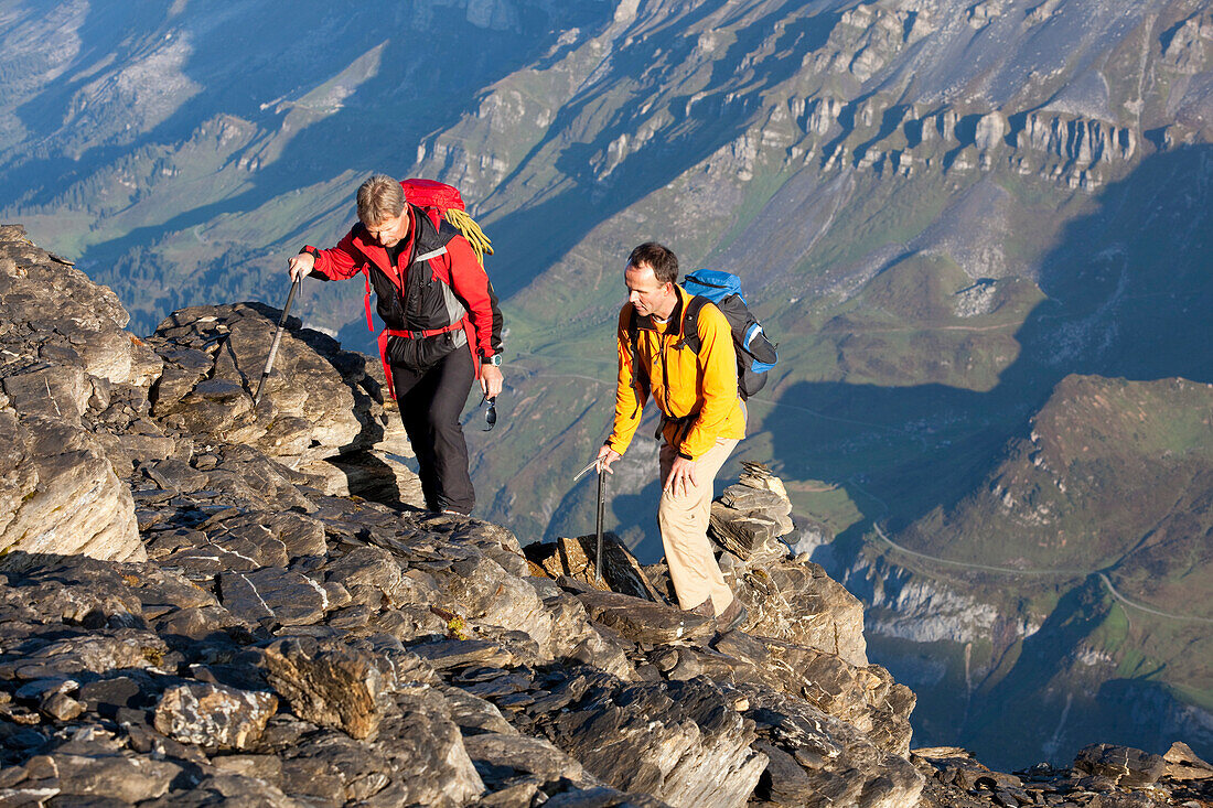 Two mountaineers ascending to Clariden, Canton of Uri, Switzerland