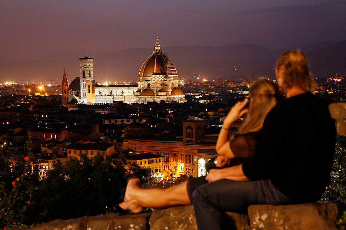 Lovers On The Piazzale Michelangelo With The Sunset Over The Duomo, Florence, Tuscany, Italy