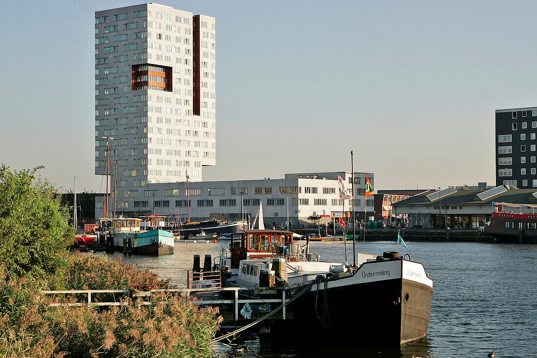 Modern Building 'The Whale', Cohabiting With Houseboats At The Foot Of Java And Knsm Eiland, Amsterdam, Netherlands