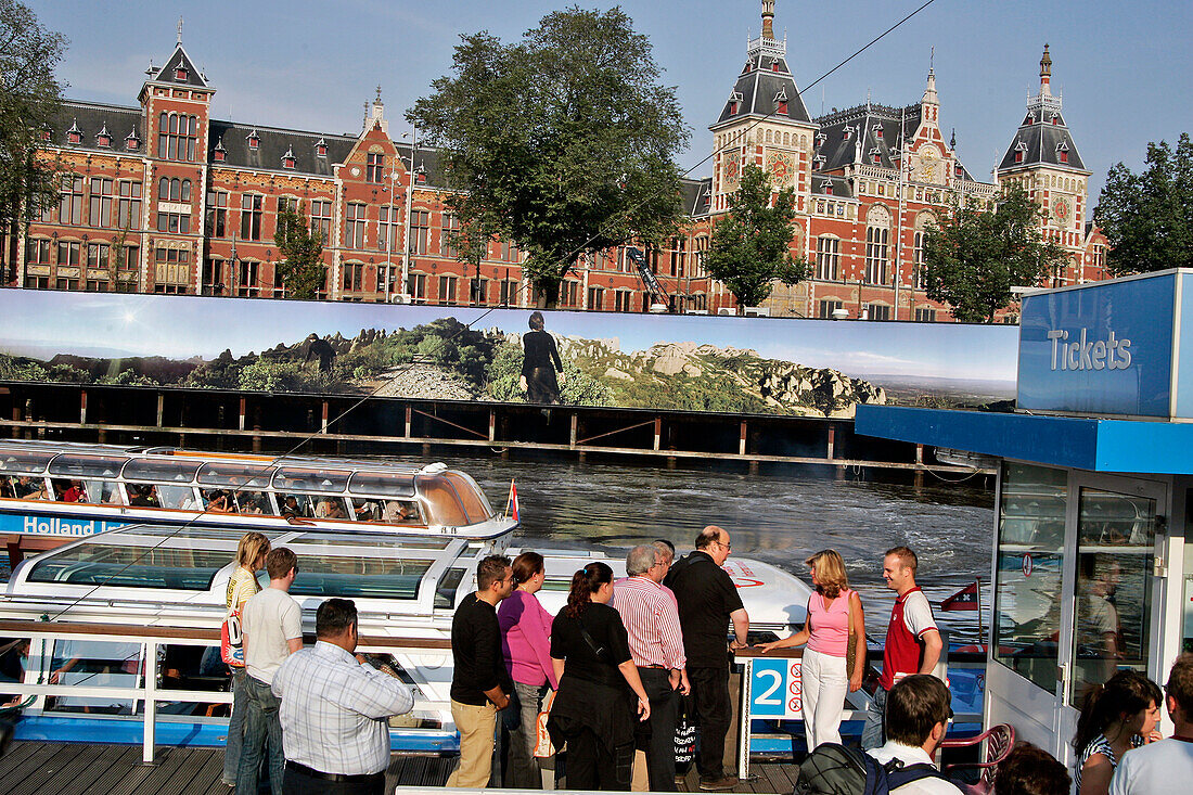 Pier For Boat Rides On The Canals In Front Of The Main Train Station, Amsterdam, Netherlands