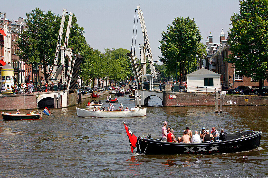 Boat With A Flag With Three Crosses, Emblem Of The City Of Amsterdam, Keizersgracht, Netherlands, Holland