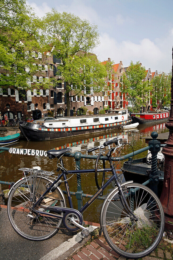 Dutch Bike, Houseboat At The Quay Of A Canal And Facade Of A Traditional House, Amsterdam, Netherlands, Holland