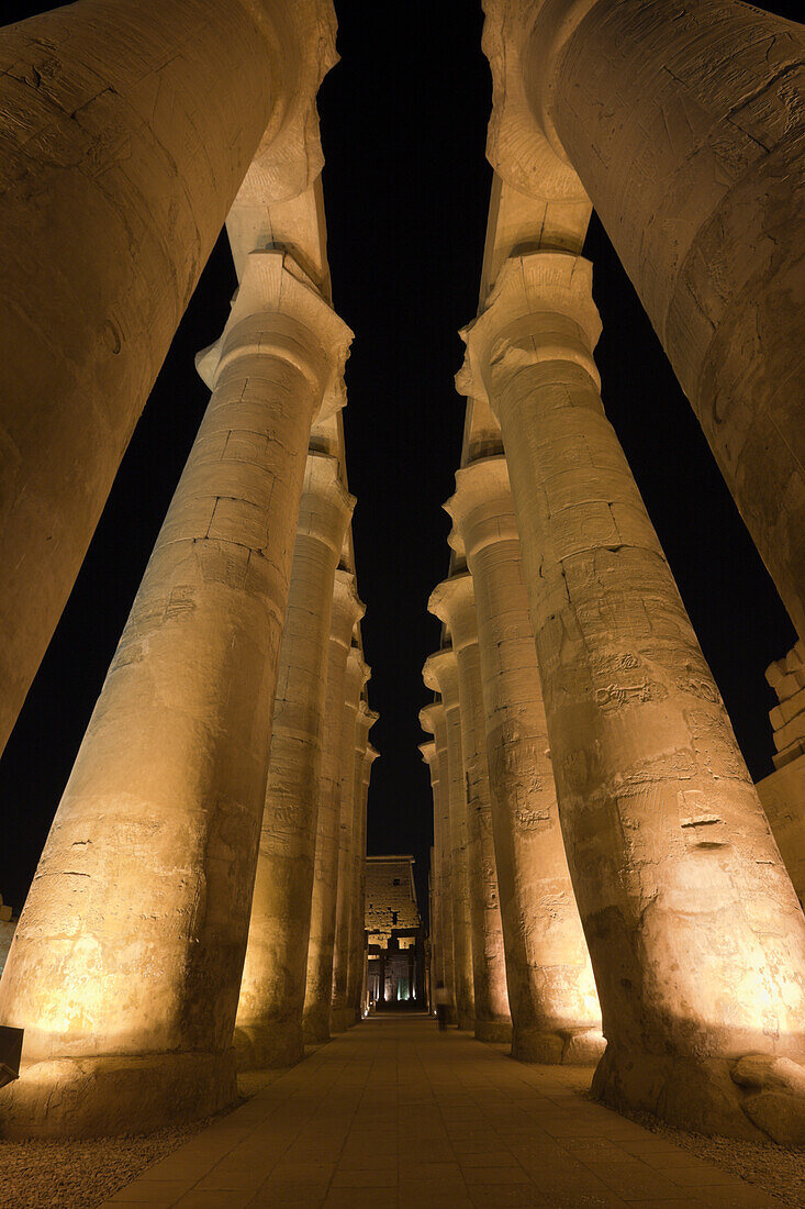 Illuminated Columned Hall inside Luxor Temple, Luxor, Egypt