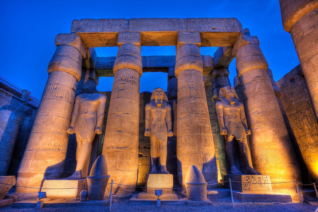 Illuminated Columned Hall inside Luxor Temple, Luxor, Egypt