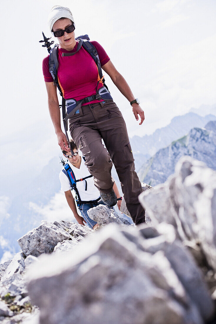 Couple hiking on Rumer Spitze, Innsbruck, Karwendel range, Tyrol, Austria