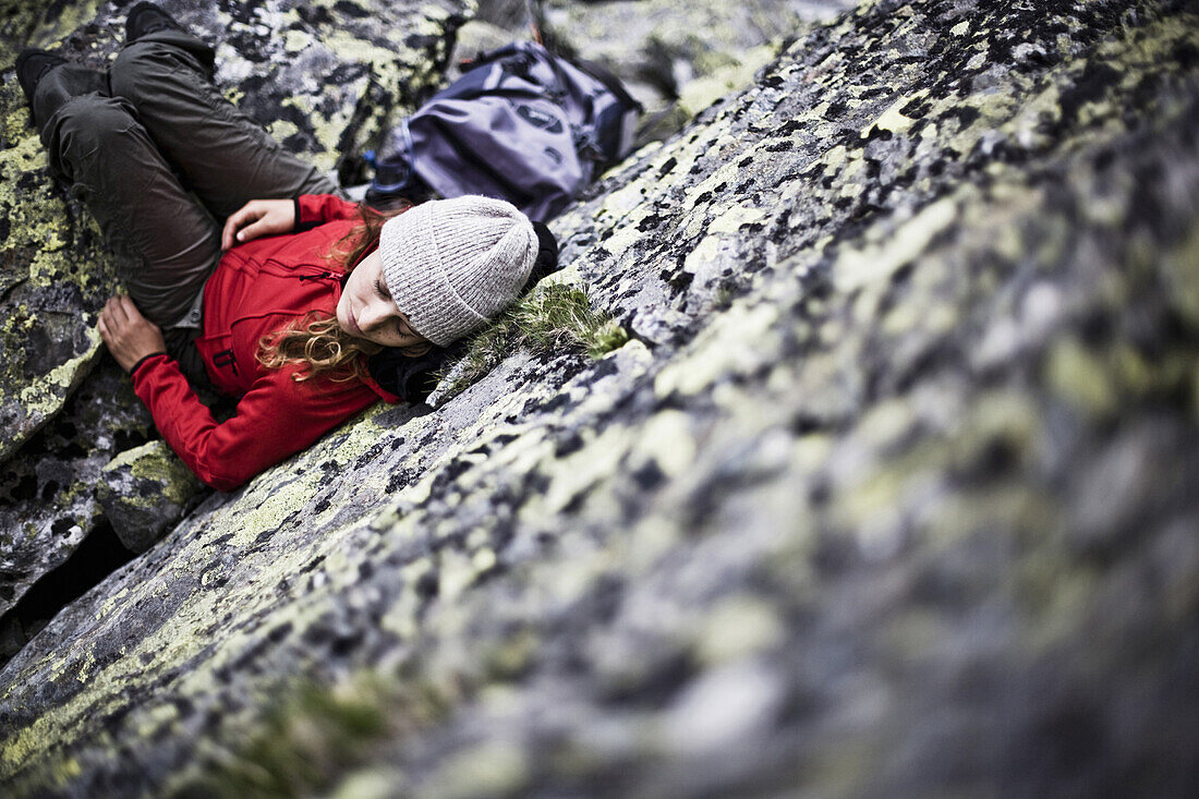 Woman resting near Sarotla Joch, Gargellen, Montafon, Vorarlberg, Austria
