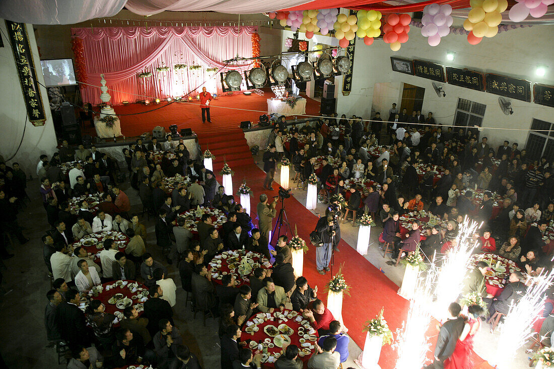 People at a festival room at a traditional chinese wedding, Jinfeng, Changle, Fujian province, China, Asia
