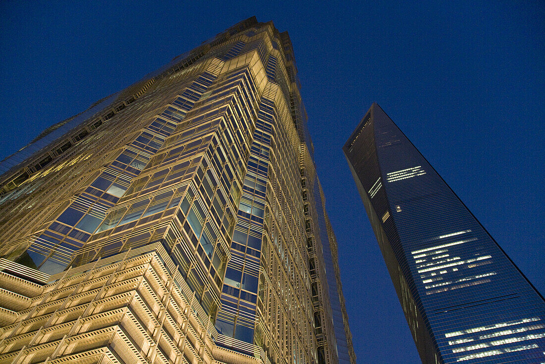 Low angle view at the illuminated Jinmao Tower, World Financial Center, EXPO Shanghai 2010, Pudong, Shanghai, China, Asia