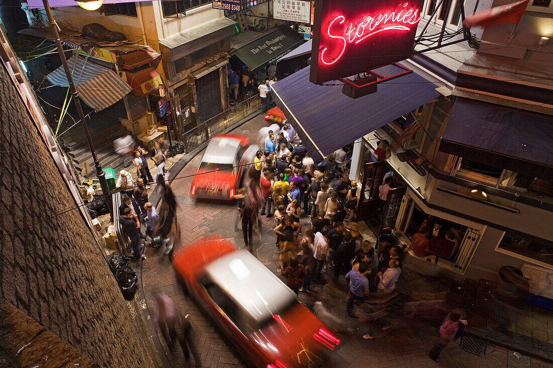 People on the street in front of a bar, Lan Kwai Fong, Hongkong, China, Asia