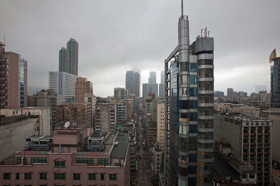 High rise buildings of Mongkok under grey clouds, Kowloon, Hongkong, China, Asia