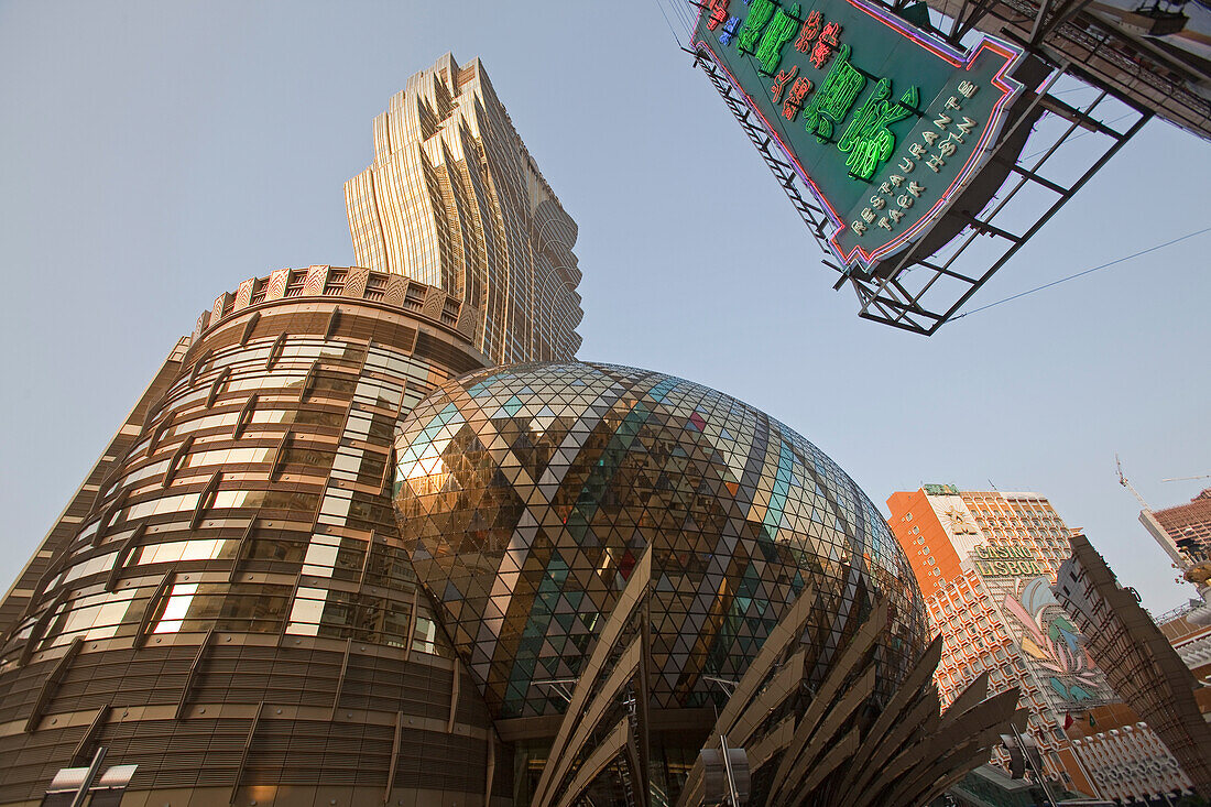 Facade of the Casino Hotel Grand Lisboa and neon sign of a pawnbroker, Macao, China, Asia