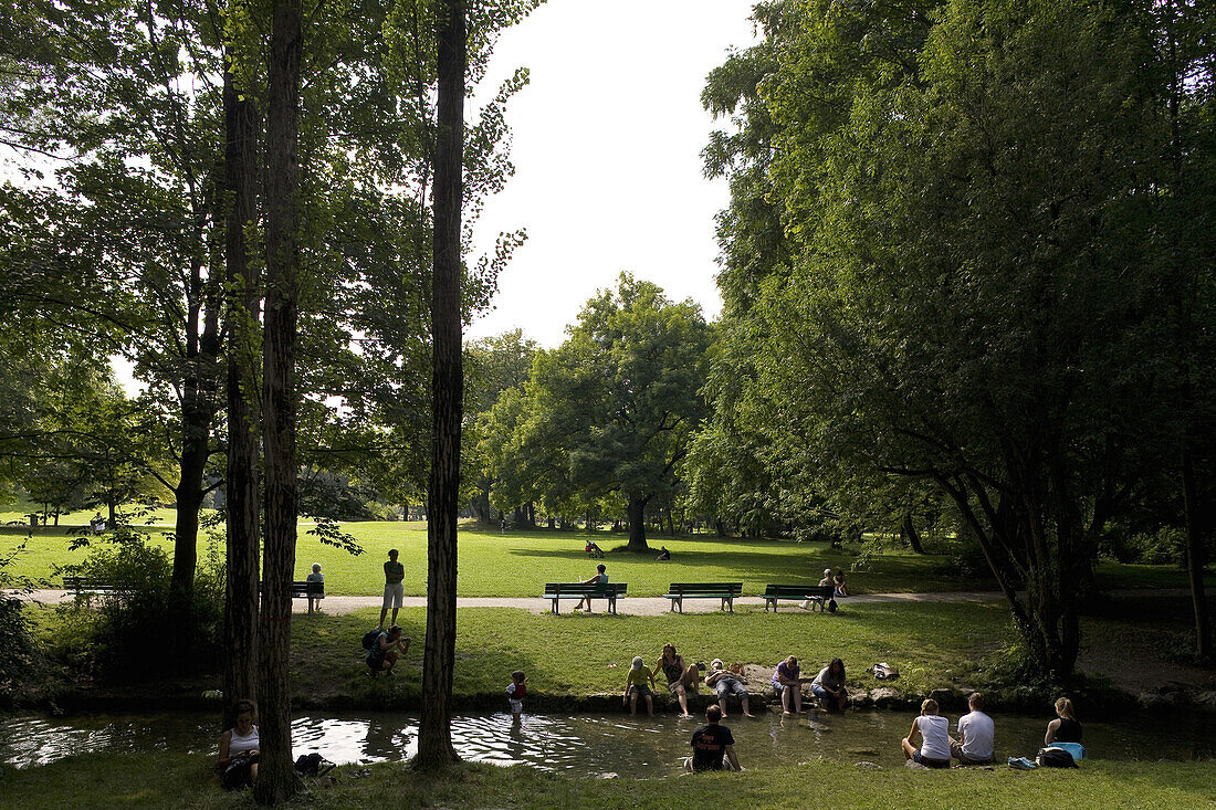 People relaxing in English Garden, Munich, Bavaria, Germany, Europe