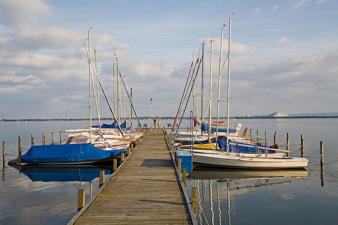 yachts berthed, lake Steinhuder reflections, Lower Saxony, Germany