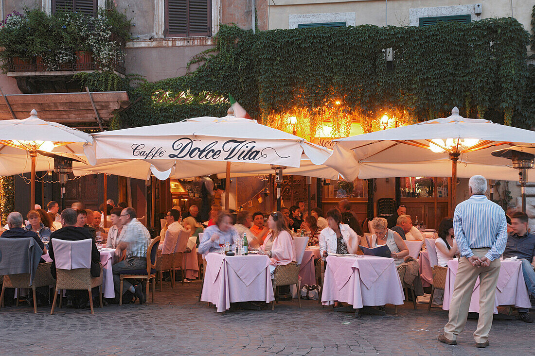 Taverna at Piazza de Navona in the evening Rome Italy