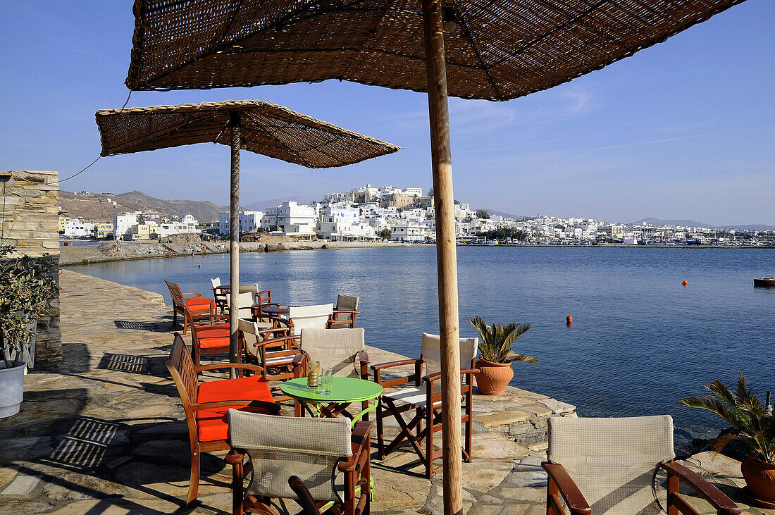 Cafe at the town of Naxos on the waterfront, island of Naxos, the Cyclades, Greece, Europe