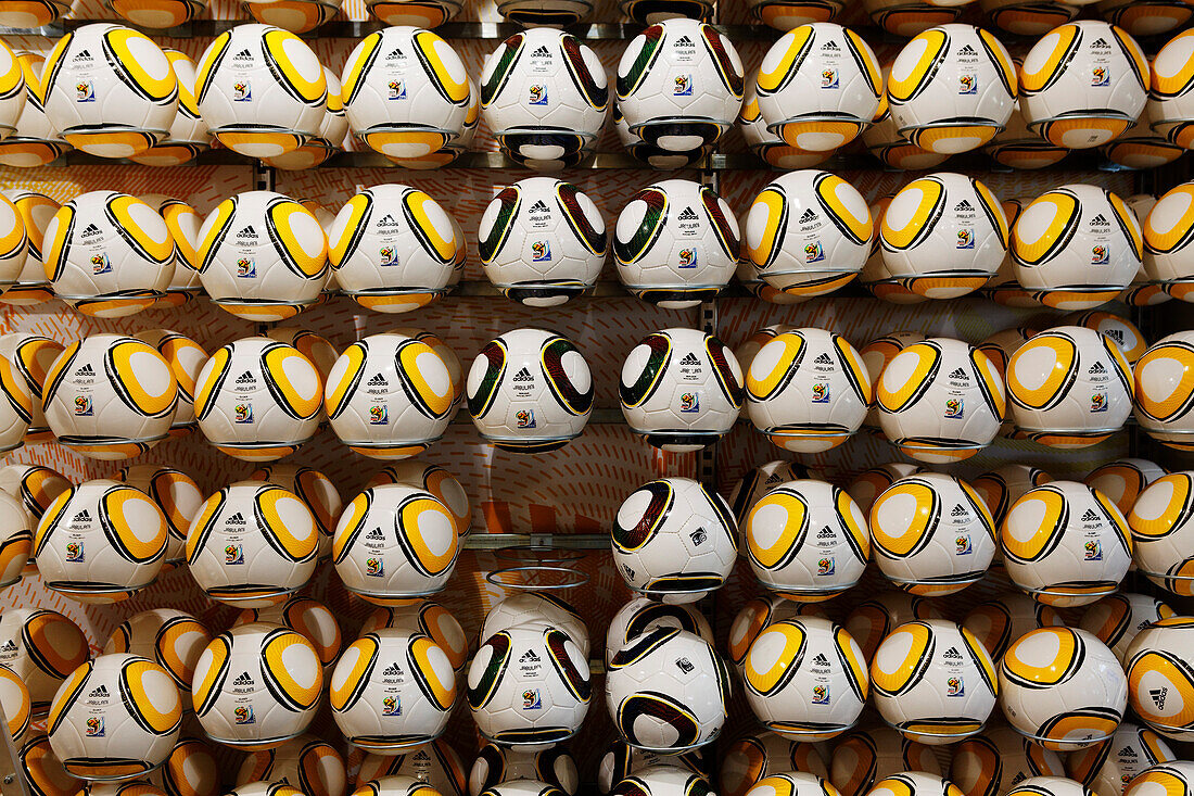 Display of footballs in a sports shop, one missing, FIFA World Cup, Capetown, Western Cape, RSA, South Africa, Africa