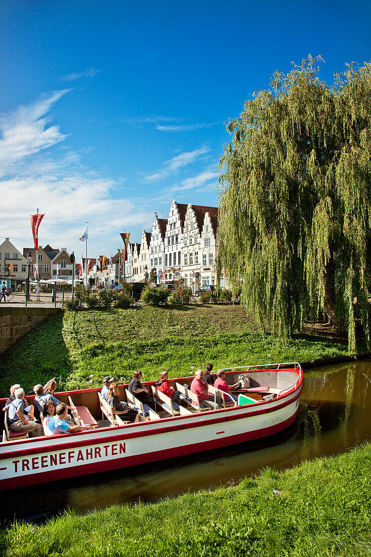 Excursion boat on canal, Friedrichstadt, Schleswig-Holstein, Germany