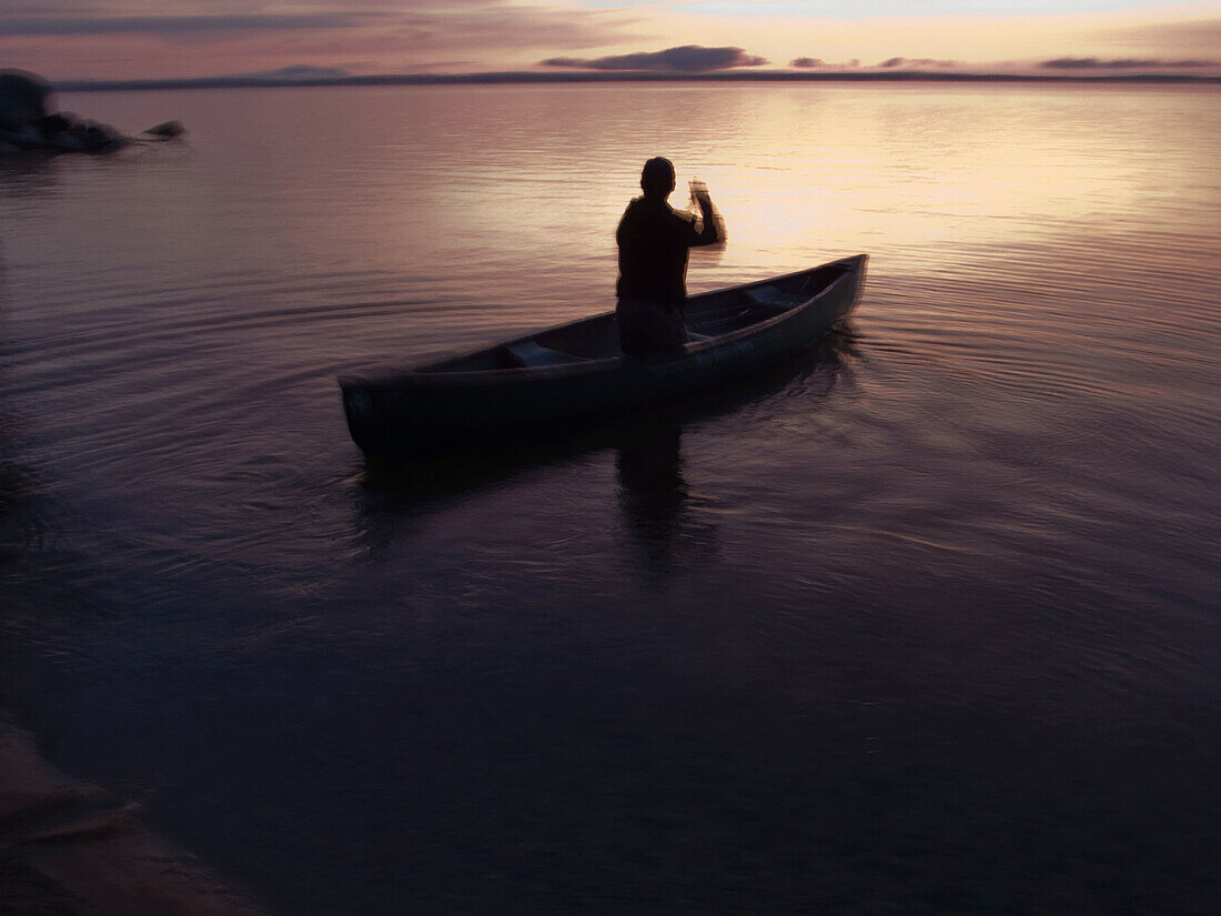 Sunrise canoe trip in Sebago Lake,  Maine,  United States of America