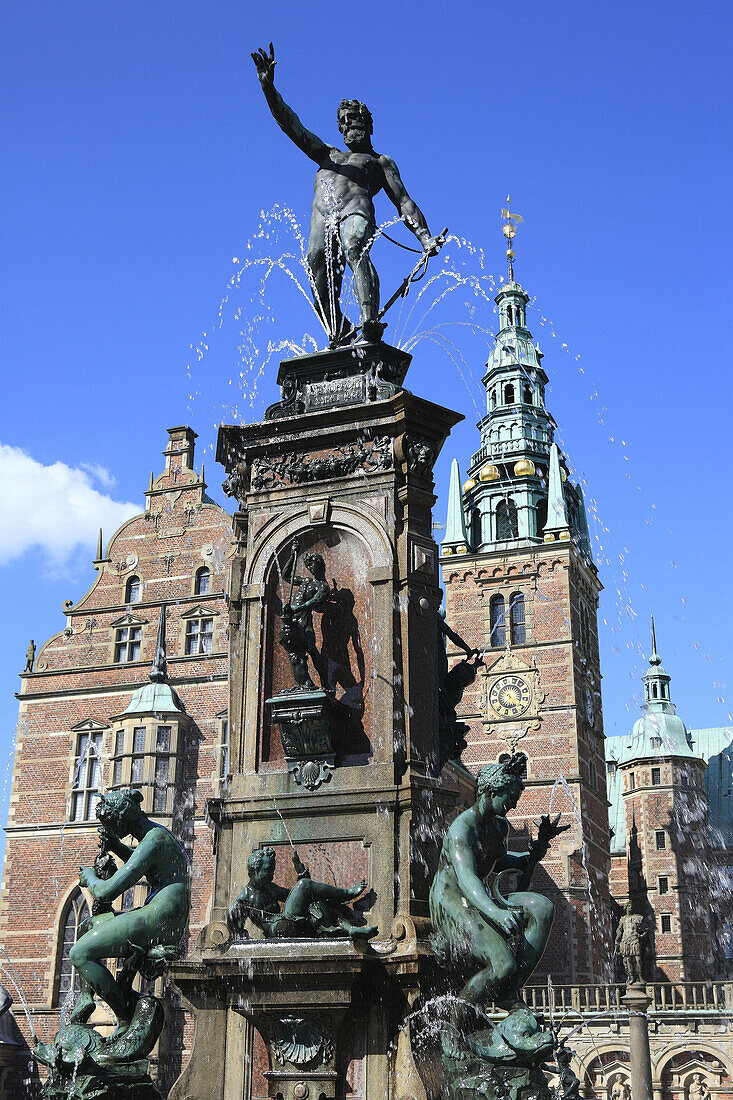 Neptune´s fountain (1622,  1888) and Frederiksborg palace (1602-1620 by architects Hans and Lorents van Steenwinckel),  Hillerod near Copenhagen,  Denmark
