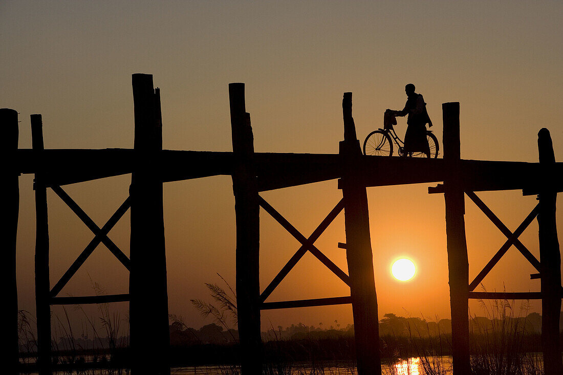 Pedestrian on U Bein Bridge,  Taugthaman Lake