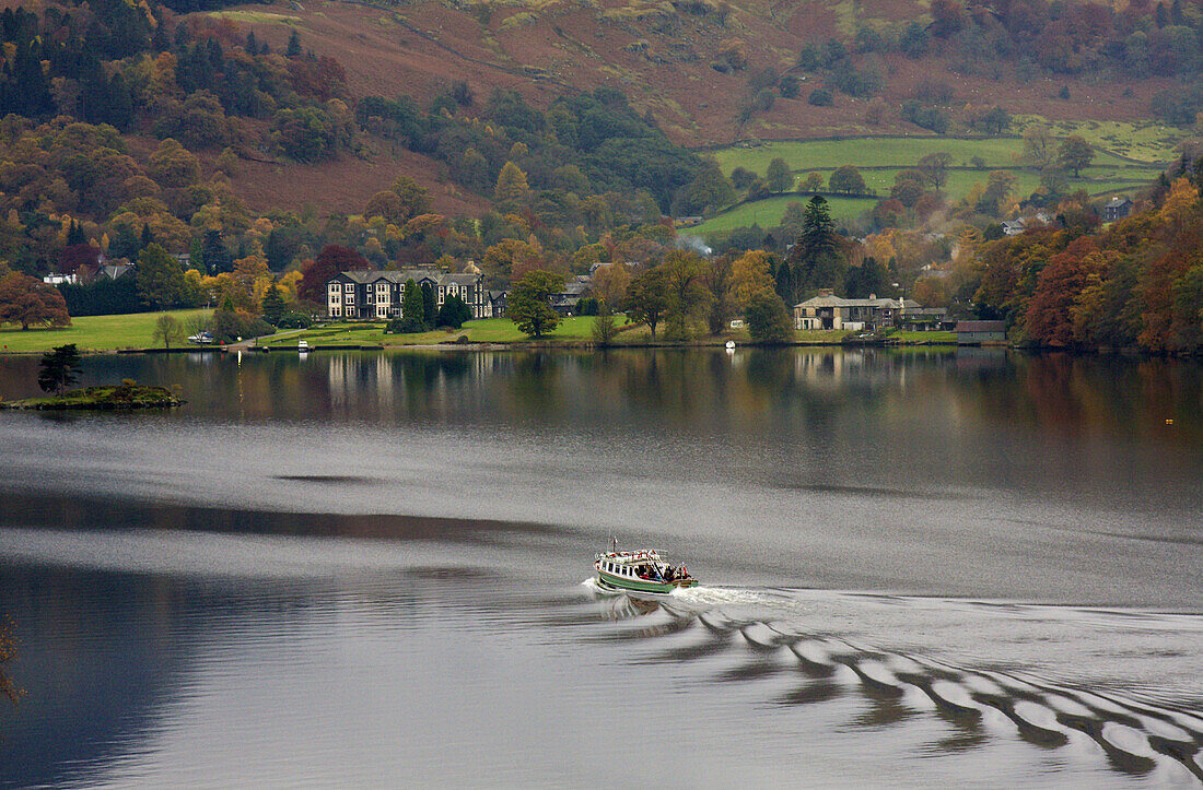 Pleasure boat on Ullswater lake,  approaching Glenridding,  Lake District,  Cumbria,  England
