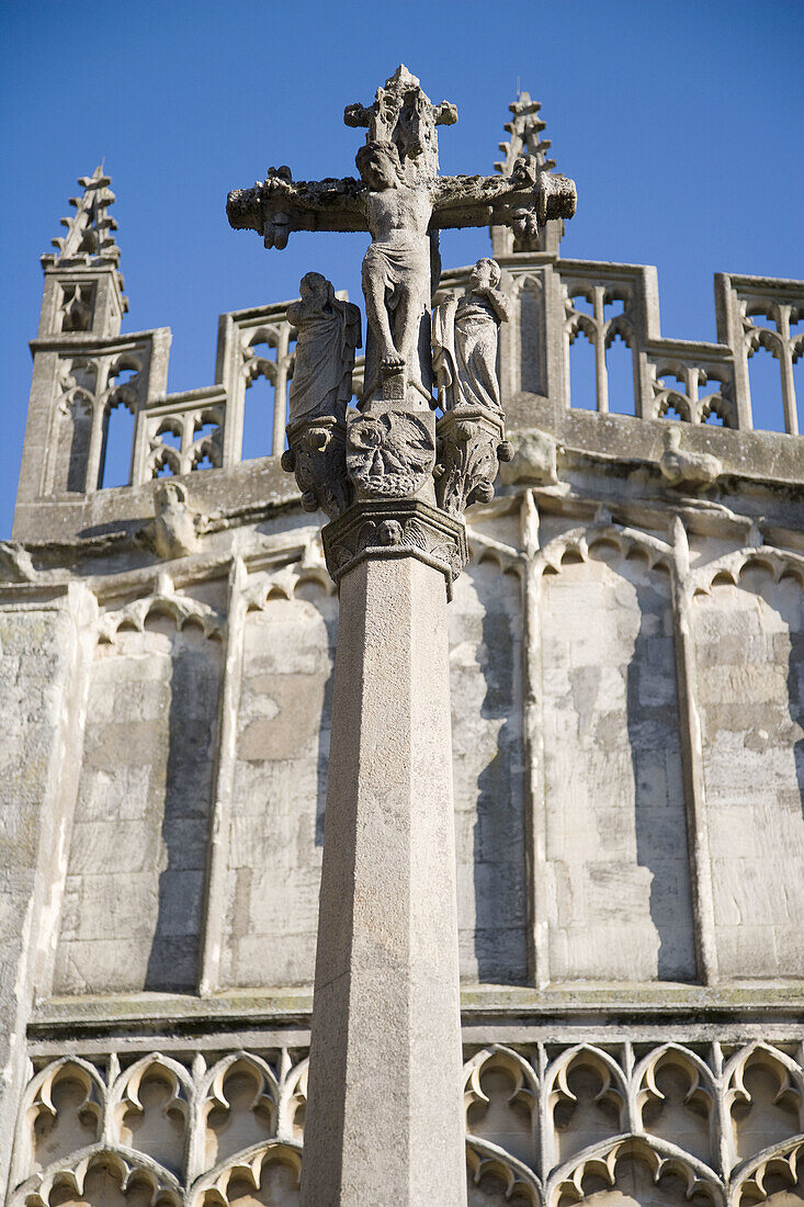 South porch and cross,  Church of St. John the Baptist,  Cirencester. Cotswolds,  Gloucestershire,  England,  UK