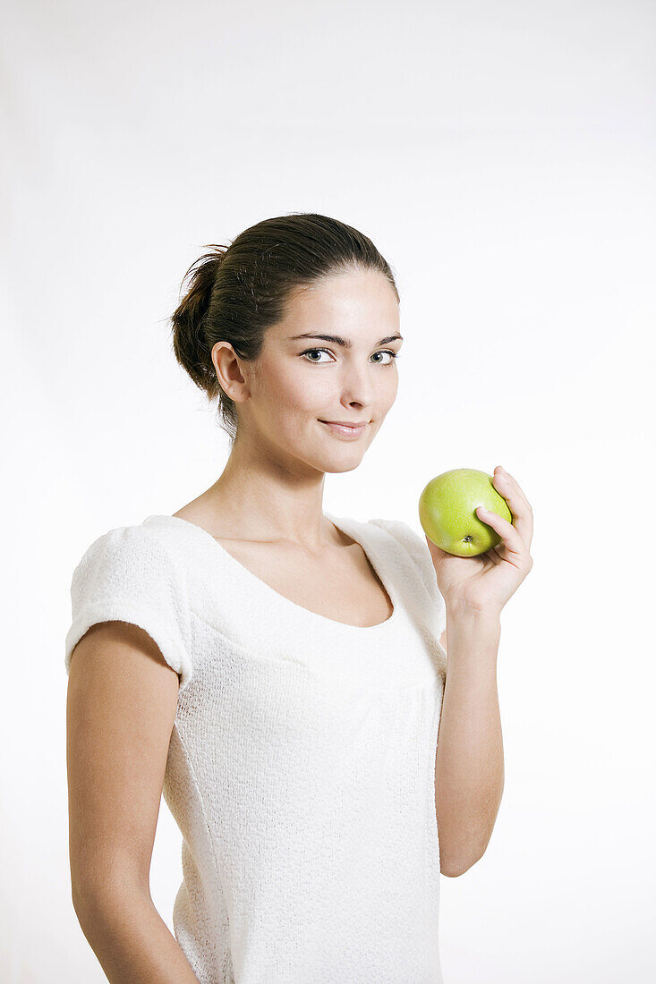 Young woman with an apple