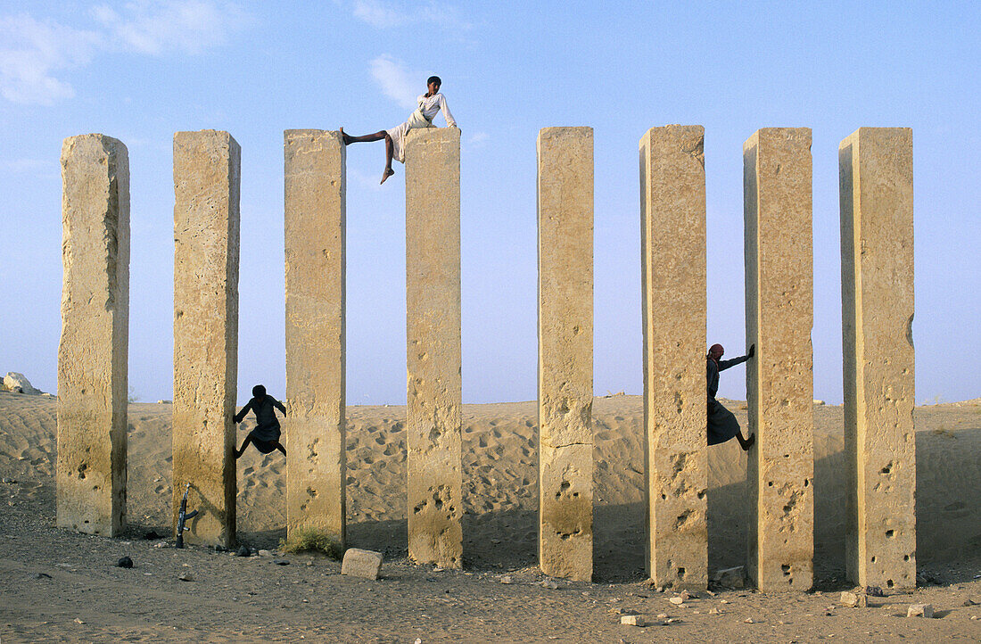 CHILDREN CLIMBING MAHRAM BILKIS TEMPLE,  MARIB,  YEMEN