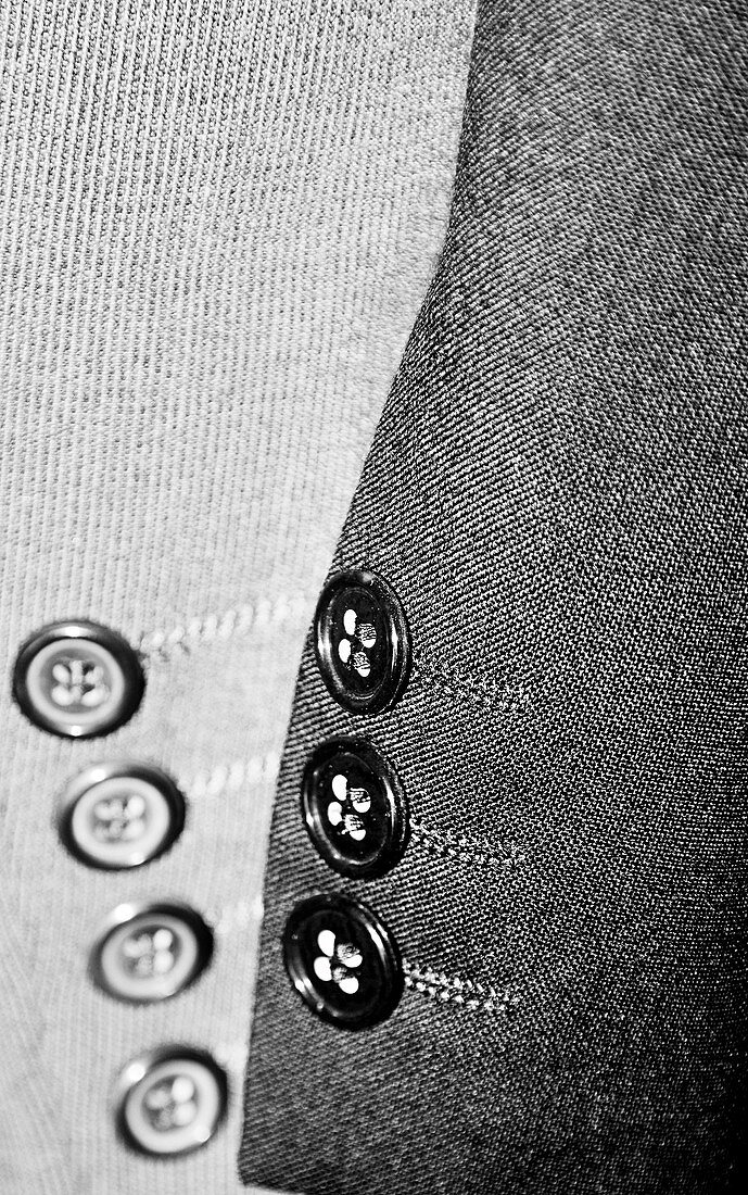 Jackets hanging in wardrobe,  detail
