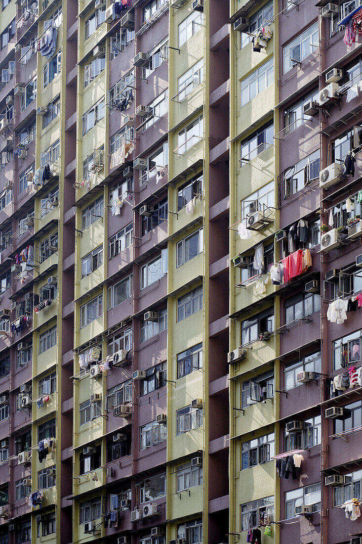 Facade of a residential,  highrise building in the middle of Hong Kong Island
