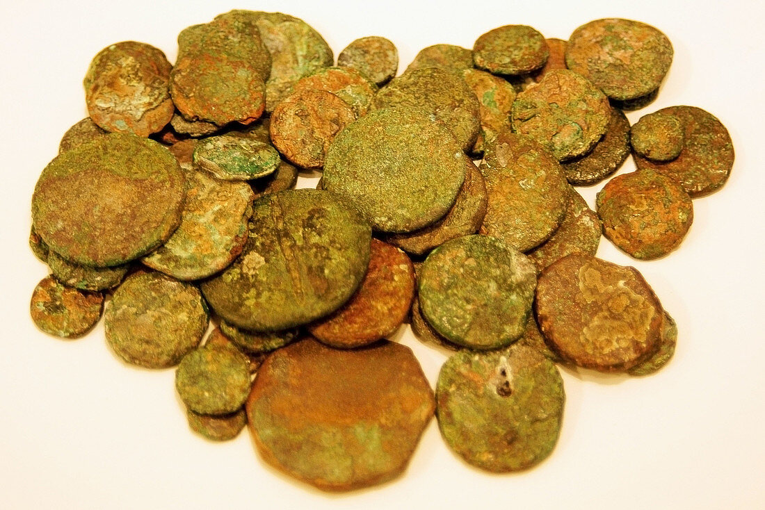Bronze coins from a wrecked ship in Favaritx preserved in the Musem of Minorca,  Mao. Minorca,  Balearic Islands,  Spain