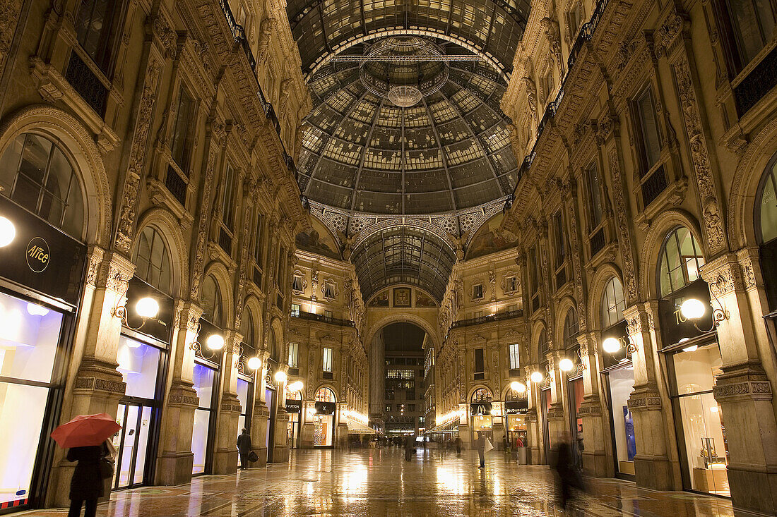 Italy,  Milan,  shopping arcade interior,  illuminated at dusk  Galleria Vittorio Emanuele II
